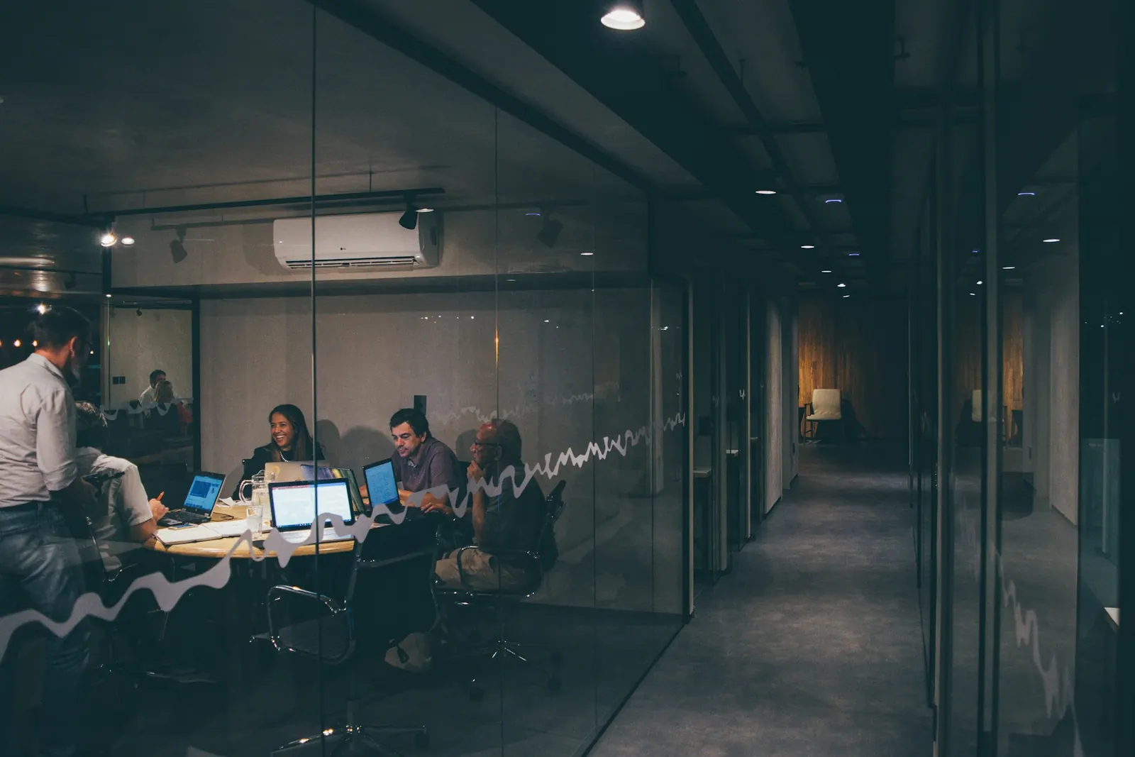 Technology team collaborating in a focused workspace